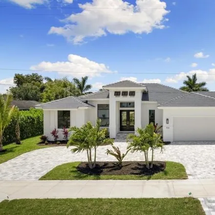 Buy this 3 bed house on 757 Tigertail Court in Marco Island, FL 34145