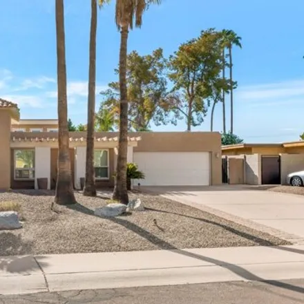 Rent this 4 bed house on 1897 East Lodge Drive in Tempe, AZ 85283