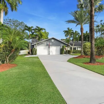 Buy this 4 bed house on 12750 Oak Arbor Dr in Boynton Beach, Florida