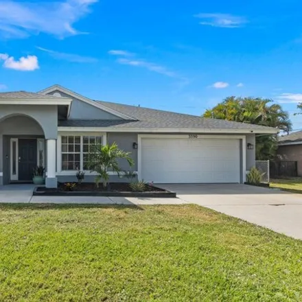 Buy this 3 bed house on 3612 Southwest Voyager Street in Port Saint Lucie, FL 34953