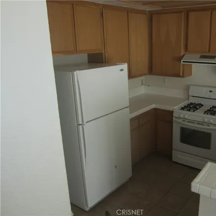 Rent this 2 bed townhouse on 25524 Schubert Circle in Stevenson Ranch, CA 91381