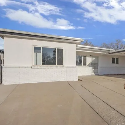 Buy this 4 bed house on 1516 Moon Street Northeast in Albuquerque, NM 87112