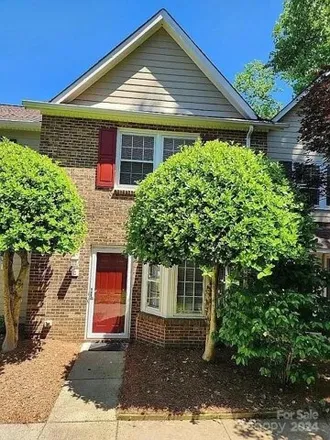 Buy this 2 bed townhouse on 8221 Pineville Matthews Rd Apt G in Charlotte, North Carolina