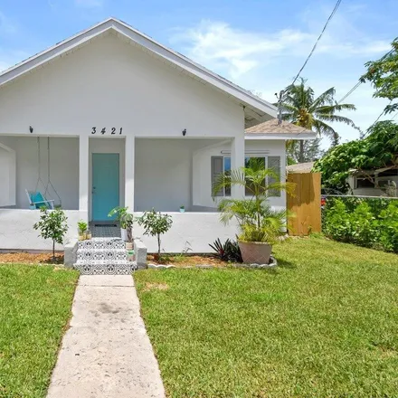 Buy this 4 bed house on 3421 Pinewood Avenue in West Palm Beach, FL 33407