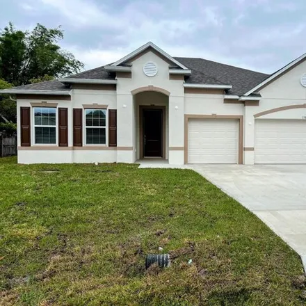 Rent this 4 bed house on 1575 Jasper Avenue Northwest in Palm Bay, FL 32907