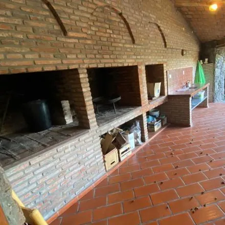 Buy this 5 bed house on Alpatacos in Departamento Colón, Río Ceballos