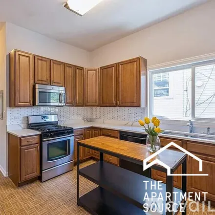 Rent this 2 bed apartment on 2536 W Logan Blvd
