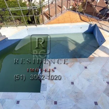 Rent this 6 bed apartment on Rua Jaraguá in Bela Vista, Porto Alegre - RS