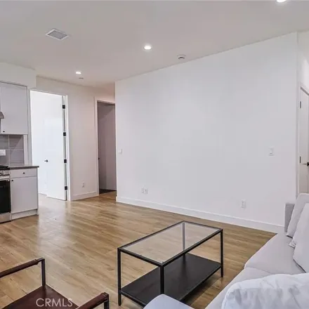 Rent this 3 bed apartment on 163 North Hoover Street in Los Angeles, CA 90004