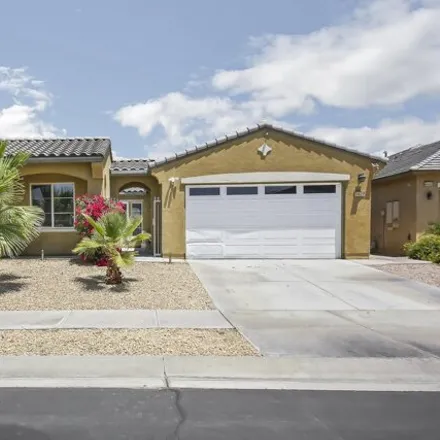 Rent this 4 bed house on 84612 Pavone Way in Indio, CA 92203