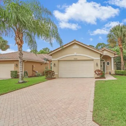 Buy this 3 bed house on 7660 Greenbrier Cir in Port Saint Lucie, Florida