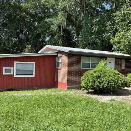 Rent this 3 bed house on 1903 NW 31st Pl in Gainesville, Florida
