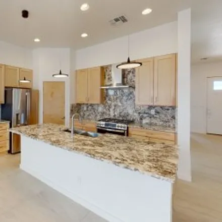 Buy this 3 bed apartment on 6705 Rimrock Circle Northwest in Northwest Albuquerque, Albuquerque