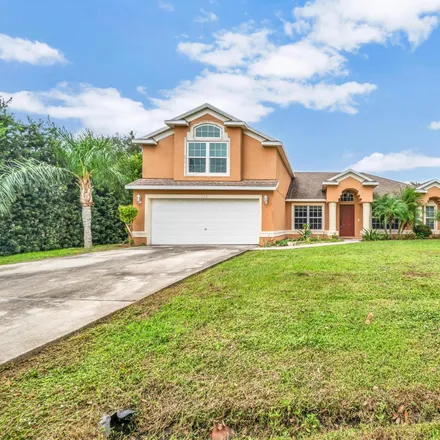 Buy this 5 bed house on 572 Northwest Avens Street in Port Saint Lucie, FL 34983