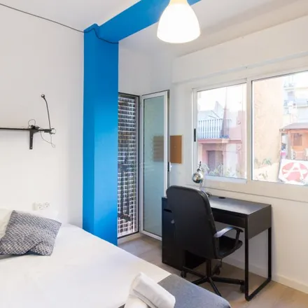Rent this 5 bed room on Carrer Nou de la Rambla in 08001 Barcelona, Spain
