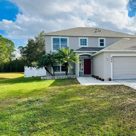 Buy this 4 bed house on 980 Derbyshire Drive in Poinciana, FL 34758