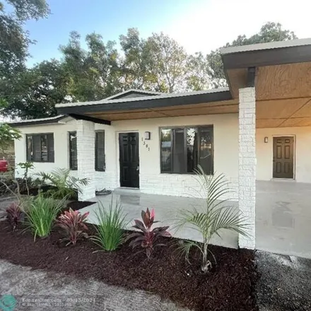 Buy this 4 bed house on 1585 Northwest 32nd Avenue in Lauderhill, FL 33311