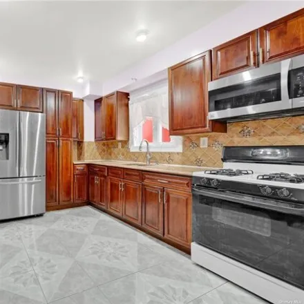 Buy this 2 bed house on 102-12 135th Street in New York, NY 11419