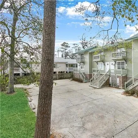 Rent this 2 bed townhouse on 401 Coffee Street in Mandeville, LA 70448