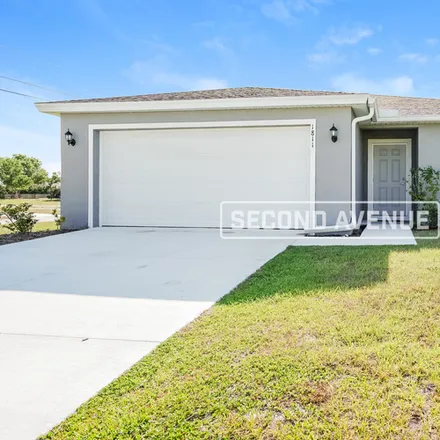 Rent this 4 bed house on 1811 NW 15th Ave