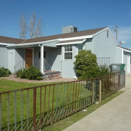 Buy this 4 bed house on 1841 Golden Gate Avenue in Dos Palos, Merced County