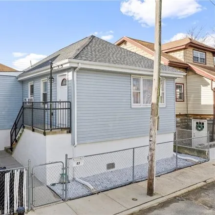 Buy this 2 bed house on 43 Aster Court in New York, NY 11229