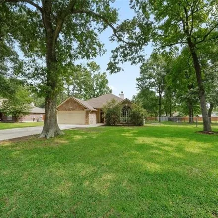 Buy this 4 bed house on 7330 Charred Pine Drive in Montgomery County, TX 77354