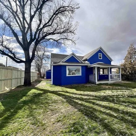 Buy this 5 bed house on 1153 14th Street in Wheatland, WY 82201