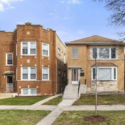 Buy this 4 bed house on 5013 North Mango Avenue in Chicago, IL 60630