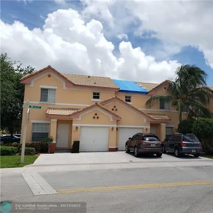 Rent this 3 bed townhouse on 8722 Southwest 21st Court in Miramar, FL 33025
