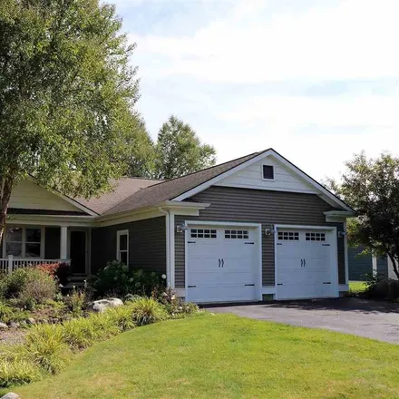 Buy this 4 bed house on 7678 Evergreen Ridge Drive in West Traverse Township, MI 49740
