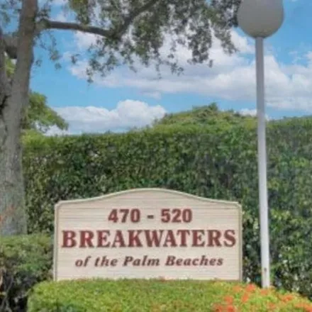 Rent this 2 bed condo on 500 Executive Center Dr Apt 2h in West Palm Beach, Florida