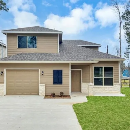 Rent this 4 bed house on 999 Comanche Road in Conroe, TX 77316