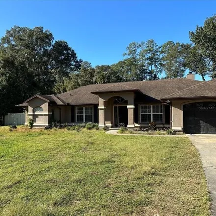 Rent this 4 bed house on 6098 Southeast 21st Court in Marion County, FL 34480