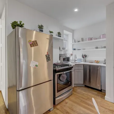 Rent this 4 bed apartment on 61-47 Woodbine Street in New York, NY 11385