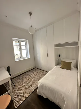 Rent this 4 bed room on Rua Frei Bartolomeu dos Mártires in 1300-166 Lisbon, Portugal
