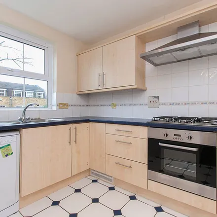 Rent this 4 bed apartment on Leeward Gardens in London, SW19 7QR
