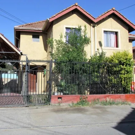 Buy this studio house on Pasaje Alcalde Jorge Moya in 870 0000 Provincia de Santiago, Chile