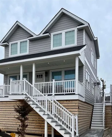 Rent this 7 bed house on 448 Dehnhoff Walk in Village of Ocean Beach, Islip