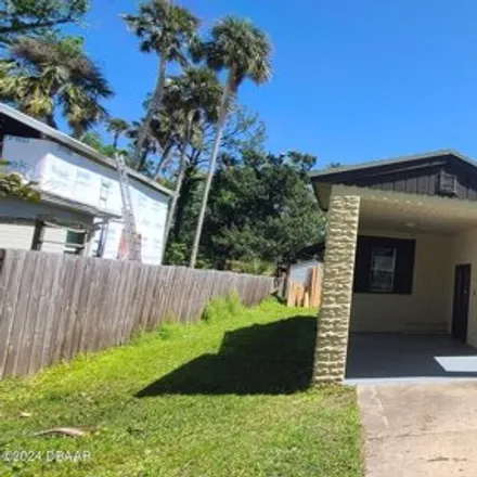 Rent this 3 bed house on 921 South Palmetto Avenue in Daytona Beach, FL 32114