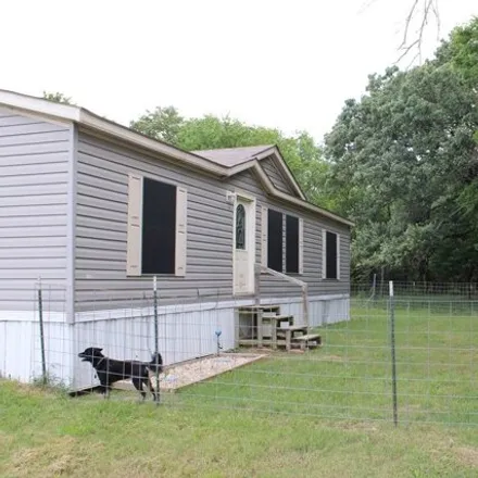 Buy this studio apartment on 2494 County Road 2546 in Quinlan, Texas