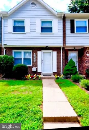 Rent this 3 bed townhouse on 14814 Emberdale Drive in Woodbridge, VA 22193