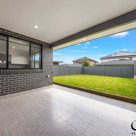 Rent this 5 bed apartment on 9 Limelight Circuit in Gregory Hills NSW 2557, Australia