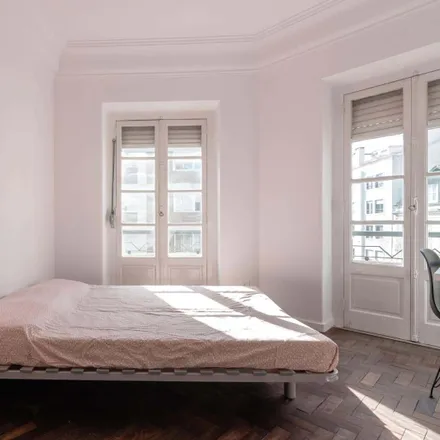 Rent this 7 bed room on Rua José Estevão 24 in 1150-192 Lisbon, Portugal