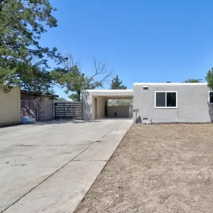Buy this 4 bed house on 1069 Indiana Street Southeast in Albuquerque, NM 87108