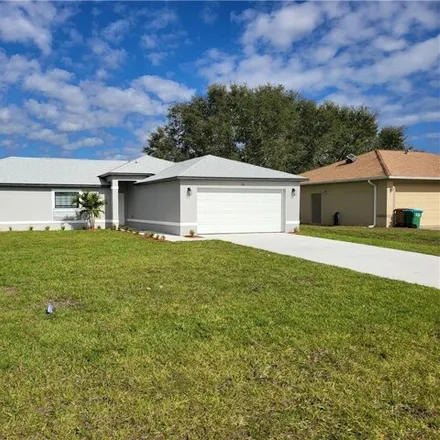 Rent this 3 bed house on Northeast 10th Street in Cape Coral, FL 33909