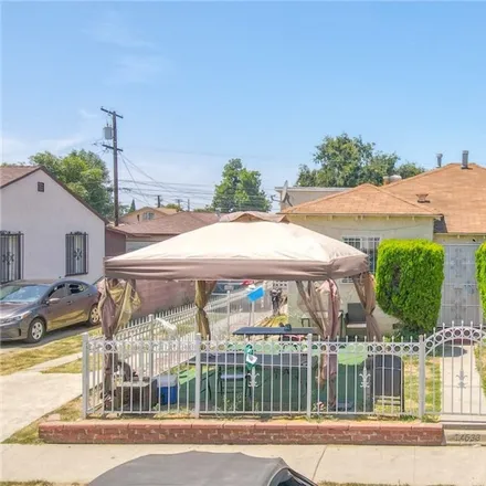 Buy this studio duplex on 14533 South Butler Avenue in East Compton, Los Angeles County