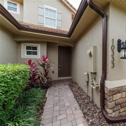 Buy this 4 bed townhouse on 10347 Belfry Circle in Orange County, FL 32827