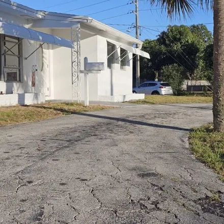 Buy this 2 bed house on 1686 12th Avenue North in Lake Worth Beach, FL 33460