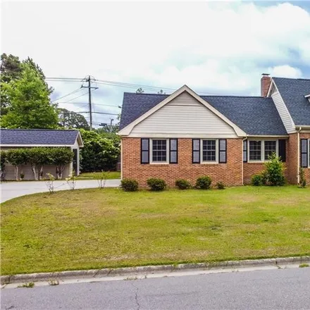 Buy this 4 bed house on 3202 Barker Street in Lumberton, NC 28358